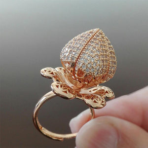 ROTATING ROSE RING