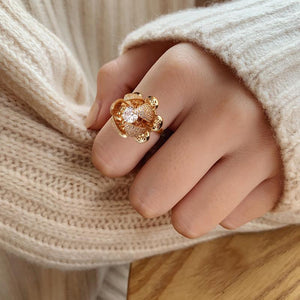 ROTATING ROSE RING